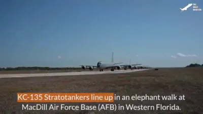 Watch the High-Stakes Maneuver: The Flying Boom Operator Performing Refueling Mid-Air