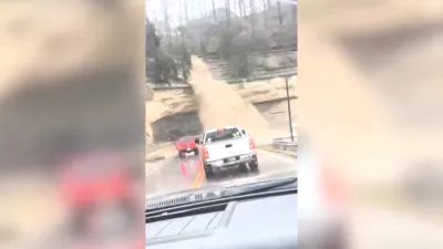 Waterfall Surges Onto Road in Madison, Indiana.