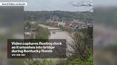 Video captures floating dock as it smashes into bridge during Kentucky floods