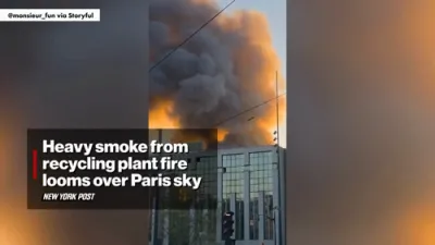 Heavy Smoke Blankets Paris ass Recycling Plant is on Fire