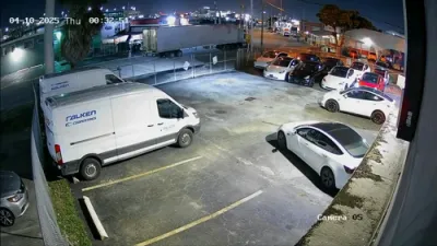 Gate Smashed by a Suspect During Tesla Heist. 