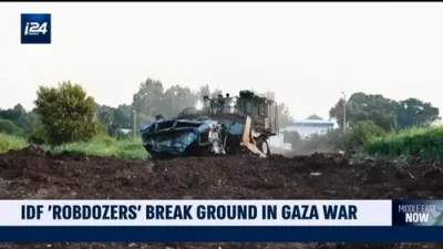 Robot Bulldozers Break Ground in Gaza War Effort.