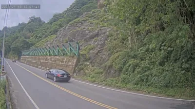 Car Dodges Death as Massive Boulders Crush Road.