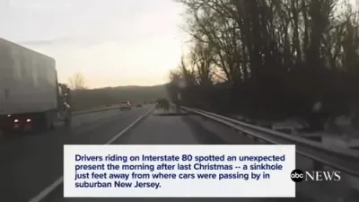 Dashcam Video Shows Drivers Staring Into Sudden Sinkhole.