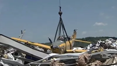 Plane Pulled From Rubble in Kentucky Airport.