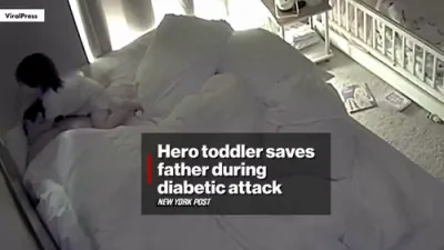 Footage of 2-Year-Old Toddler Saves Dad's Life. 