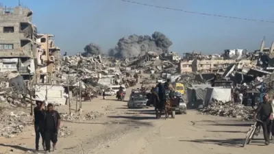 Footage Shows Gazans Fleeing Through Dust Cloud. 