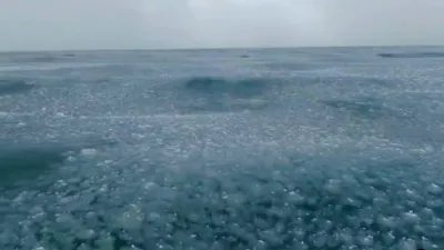Filmmaker Battles Unpredictable Ice Waves.