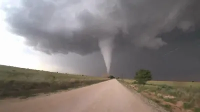 Timelapse Captures Storm Chaser's Thrilling Tornado Pursuit. 