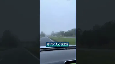 Massive Wind Turbine Stuck Under Bridge After Truck Misses Turn in Queensland. 