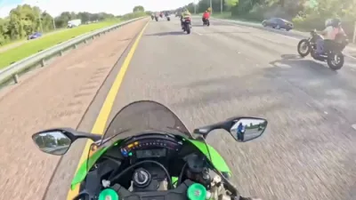 Two Motorcyclists Injured After Colliding with Alligator. 