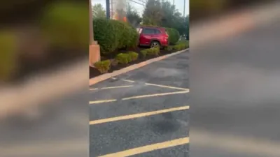 Heroic Rescue: Man Pulls Driver from Burning Car Seconds Before Explosion.
