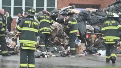 1 Dead, 1 Injured After Dumpster Emptied Into Garbage Truck.