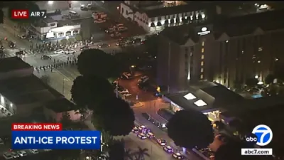Whittier Police Form Skirmish Line During Anti-ICE Protest Outside Hotel. 