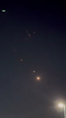 Ballistic Missiles Fired by Iran Rain Down Over Central Israel. 
