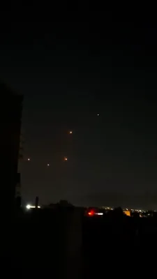 Ballistic missiles seen departing Iran for Israel.