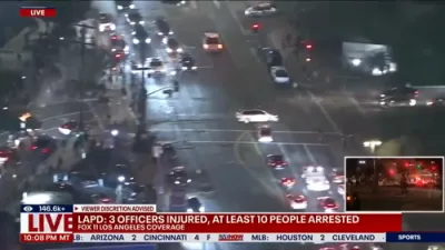 Driver Spins Reverse Donuts Around Anti-ICE Protesters in Downtown LA