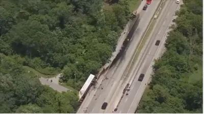 Shocking Crash: Semi-Truck Dangles Off Pennsylvania Overpass in Chester County.