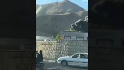 Heavy Smoke Rises Over Northern Tehran After Israeli Airstrike on Al-Mahdi Area. 