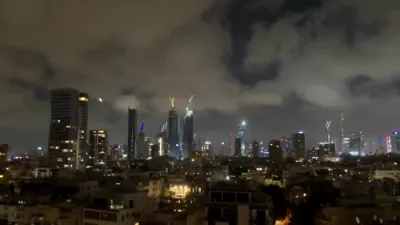 Blasts Rock Tel Aviv Skies as Israel's Iron Dome Intercepts Iranian Missiles Amid Ongoing War. 