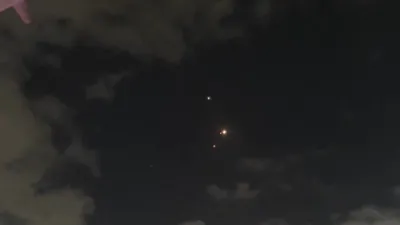 Explosions and Missile Interceptions Light Up Sky Over Tel Aviv. 