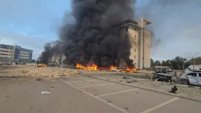 Iranian Missile Hits Near Beersheba High-Rise, Vehicles Burn as Black Smoke Fills the Sky. 