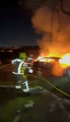 Firefighting efforts at the site of an impact in Southern Israel.
