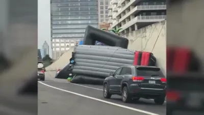 Wild Ride! Giant Inflatable Water Slides Fly Into Atlanta Traffic. 