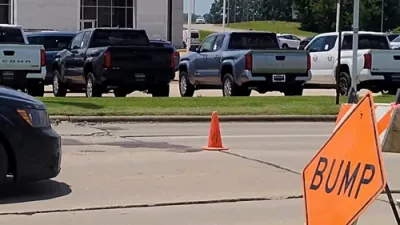 Heatwave Causes Road to Buckle, Launching Car Into the Air. 