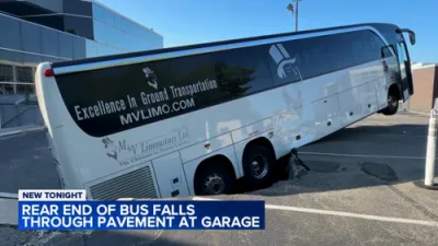 Bus Plunges Through Parking Garage Pavement in North New Hyde Park. 