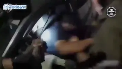 Suspected Iranian Spies Dragged from Cars. 