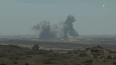 Massive clouds of smoke billow above northern Gaza. 
