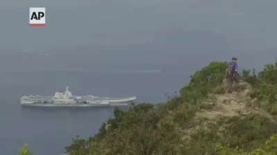 China's Shandong Aircraft Carrier Makes Historic First Arrival in Hong Kong With Full Battle Group. 
