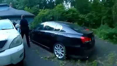 Bodycam Footage Shows Retired Cop Found Beneath Mountains of Trash.