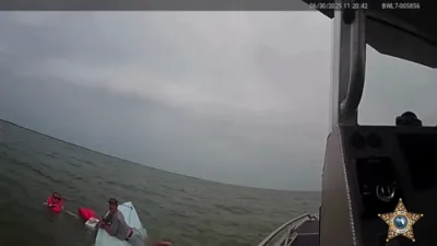 Boaters Cling to Capsized Vessel After Sudden Wave Surge in Pine Island Sound. 