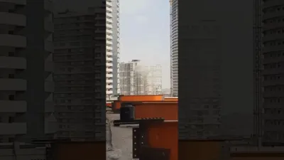 Emergency Crews Rush to Exploded Building Incident Near Chitgar Lake in Tehran. 