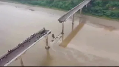 Bridge Collapse in India's Gujarat Kills at Least 9, Rescue Teams Search for Survivors. 