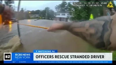 New Video of Officers Rescuing Trapped Driver from Floodwaters in Watchung, NJ. 