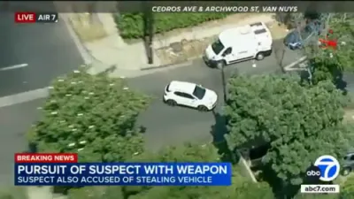 Wild Police Chase: Bystander Throws Chair at Suspect.
