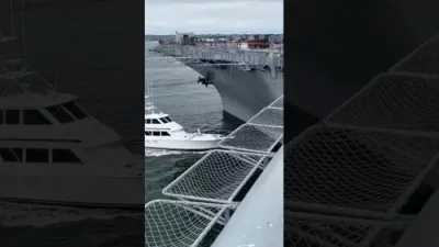 Civilian Boat Crashes Into USS Midway in San Diego. 