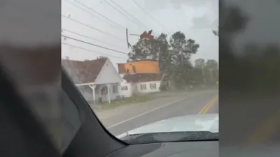 Roof Flies Off Building, Nearly Hits Car in Wild Maine Storm. 