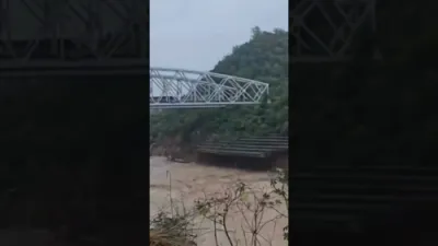 Train Narrowly Escapes Disaster as Flooded Bridge Collapses in Himachal. 