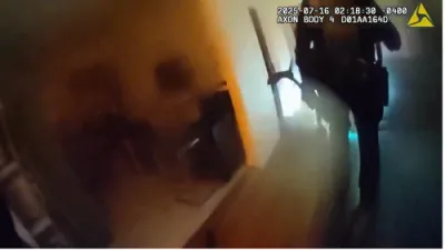NYPD Officers Rescue Two from Burning Queens Home. 