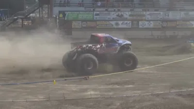 Wheel Detaches From Monster Truck and Flies Into Parking Lot.