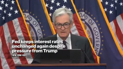 Fed Holds Interest Rates Steady Despite Pressure from President Trump. 