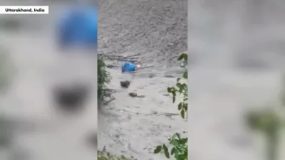 Survivor Crawls Through Mud After Flash Flood in Indian Village.