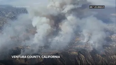 Explosive Canyon Fire Triggers Mass Evacuations. 