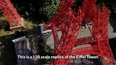 Retiree Builds 30-Meter Eiffel Tower Replica. 
