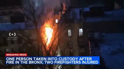 Man in Custody After Bronx Apartment Fire Injures Two Firefighters.