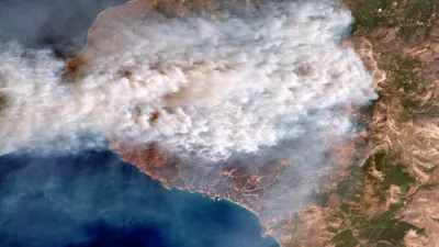 Satellite Images Reveal Wildfires Raging Across Greek Islands.